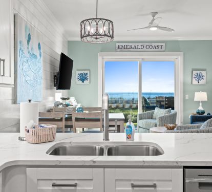 Modern Kitchen flows to living room with stunning Gulf Views 