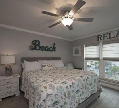 There is a king bed in this bedroom. It is connected to the second balcony. 