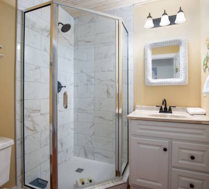 Convenient upstairs hall bath with shower.