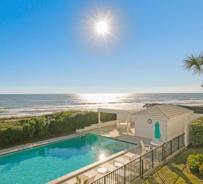 View from balcony looking West of pool, dunes, beach and gulf
