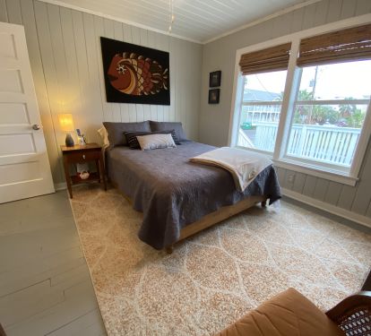 Cozy queen master bed for a great night of rest before hitting the beach.