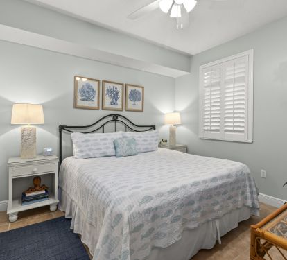 Second King Bedroom, En suite bathroom, Baskets under TV and in closet for storage