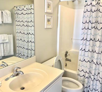 Master bathroom with shower/tub combo.