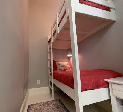 Upstairs bunk space, with door for privacy