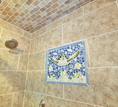 Custom turtle mosaic in shower
