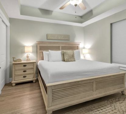 Master bedroom KING bed, with Wall Mounted LARGE TV for evening movie time!
