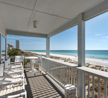 View of ocean and beach from balcony (to the east), lots of balcony furniture