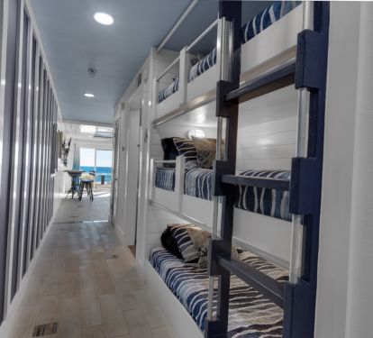 Triple twin hall bunks with privacy curtains....who&rsquo;s getting the top bunk?