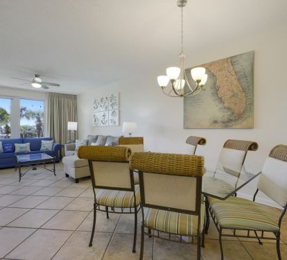 Bright and open dining and living area with Gulf views, perfect for gathering after a day on the beach in Destin.