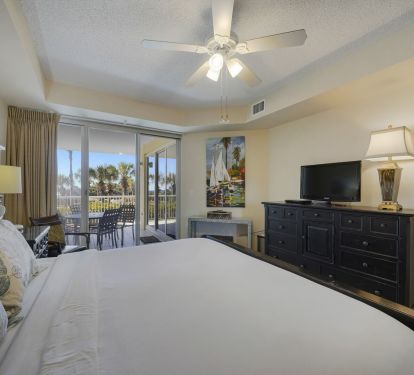 Thoughtfully designed with comfort in mind, this Destin beachfront condo bedroom blends simplicity and relaxation for a stress free stay.