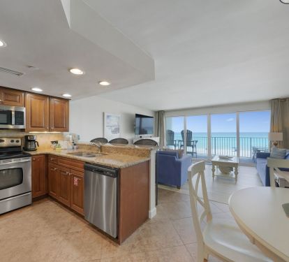 Cabana Club 205 has an open kitchen and living room with breathtaking oceanfront scenery