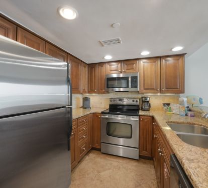 Prepare your favorite dishes with out well equipped kitchen with granite countertops and stainless appliances