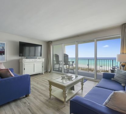 Perfect for relaxing after a beach day, the living room offers comfortable seating and front row views of the Emerald Coast.