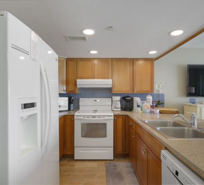 Bright coastal kitchen with full-size appliances
