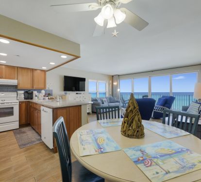 Open-concept kitchen and dining in Destin beachfront rental