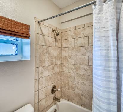 Jack & Jill Bathroom - Equipped with a Tub/Shower Combo