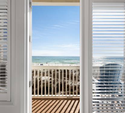 Wake up to stunning ocean waves right outside your door. This beautiful balcony offers direct beach access and endless sea views.