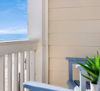 Your private balcony overlooking endless gulf waves creates the perfect spot for morning coffee and peaceful moments.