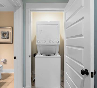 Your in-unit washer and dryer make extended stays effortless, tucked conveniently in a dedicated closet next to the bathroom.