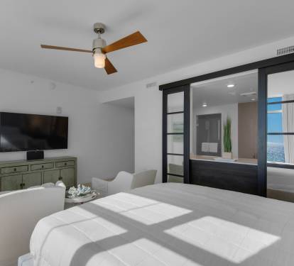 Primary Bedroom with Flat Screen TV