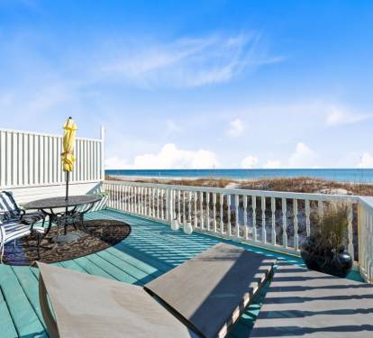 Spacious oceanfront deck with stunning sea views and comfortable seating for your morning coffee or evening relaxation.