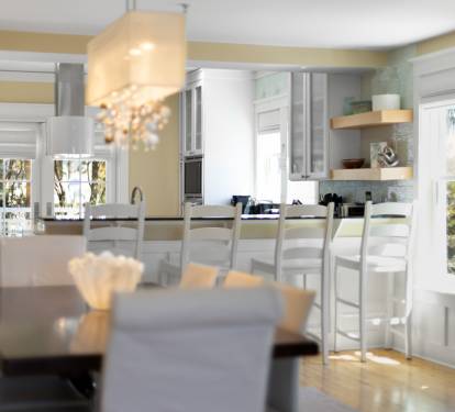 Step into your elegant open-plan kitchen where you'll love preparing meals at the spacious island while natural light streams through beautiful windows.