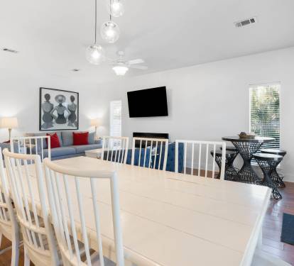 Gather around this bright dining table while enjoying mountain-top conversations in your stylish retreat.