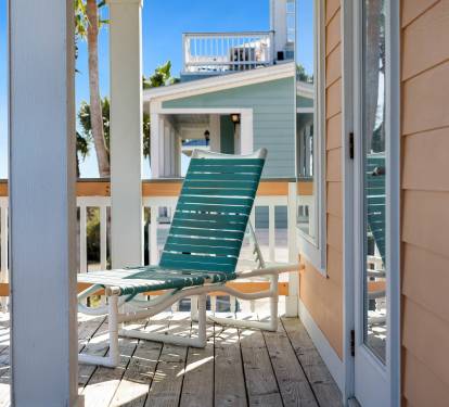 Step onto your private balcony where tropical breezes and sunshine await, perfect for morning coffee or afternoon relaxation.