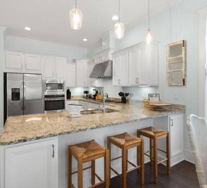 Step into your bright, modern kitchen where granite counters and stainless appliances await your culinary adventures.