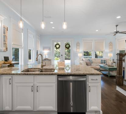 Step into your bright, open-concept haven where granite countertops and modern appliances make cooking a joy while you stay connected to loved ones.