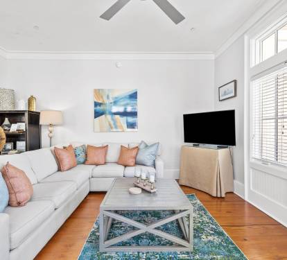 Living Area - Offers Ample Seating & Flat-Screen TV
