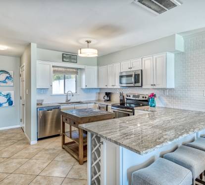 Updated Kitchen with Extra Bar Seating