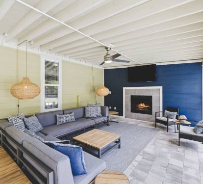 Unwind in the Screened-In Back Porch - Offering a Gas Fireplace