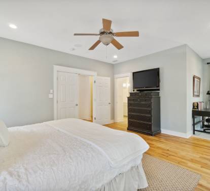 1st Floor Primary Suite - Furnished with a King Size Bed