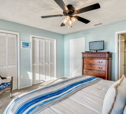 Primary King Suite - Equipped with a Flat-Screen TV