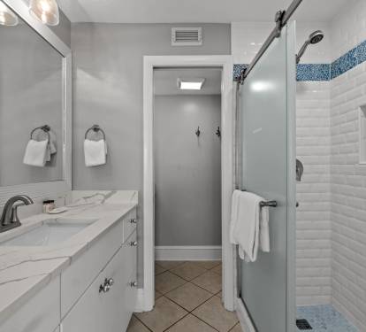 Primary En-Suite - Featuring a Freshly Tiled Walk-in Shower