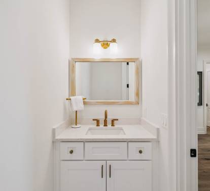 1st Floor Powder Room - Located Off the Kitchenette