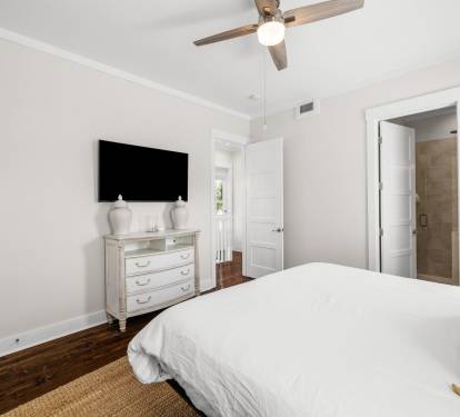 Emjoy the Flat-Screen TV in the King Guest Bedroom