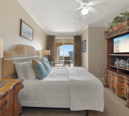 Sink into crisp white linens in your coastal bedroom, where ocean breezes flow through and nautical touches create a perfect seaside retreat.