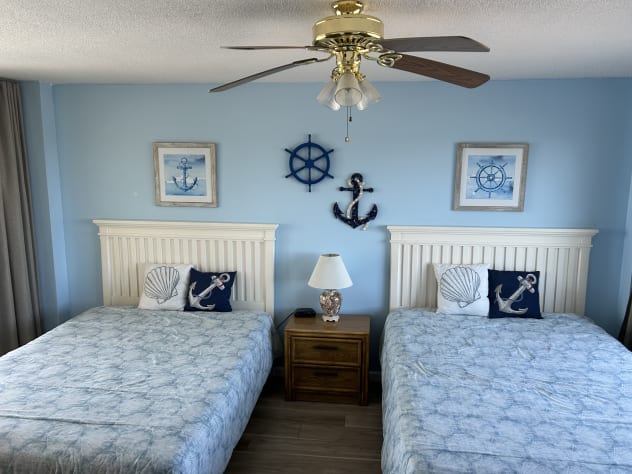 3rd bedroom with queen sized beds and private balcony