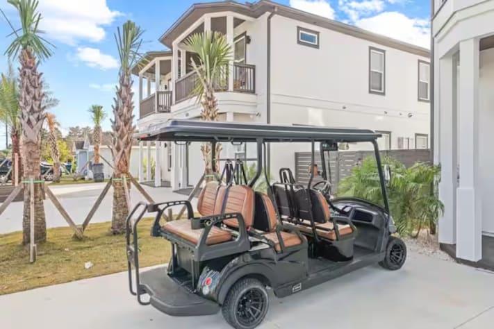 A golf cart is available for rent at the property