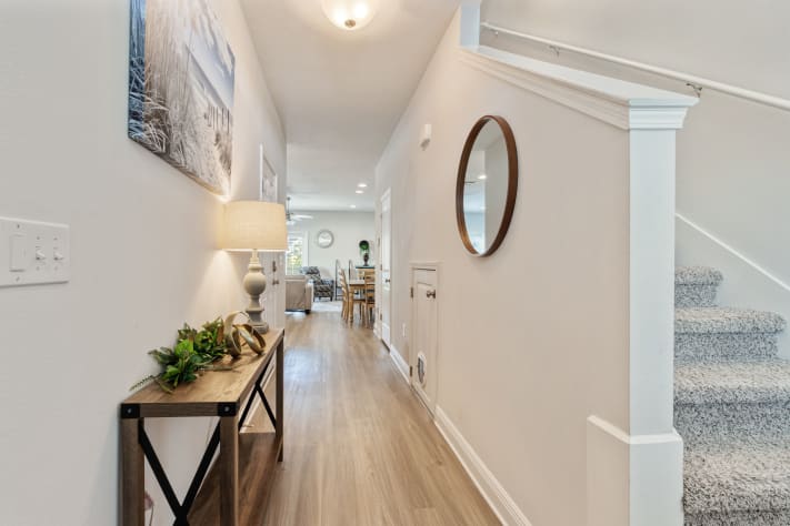 Clean, bright upstairs hallway with soft carpeting and modern finishes. Convenient access to bedrooms and bathrooms, creating a calm and comfortable flow throughout the home.
