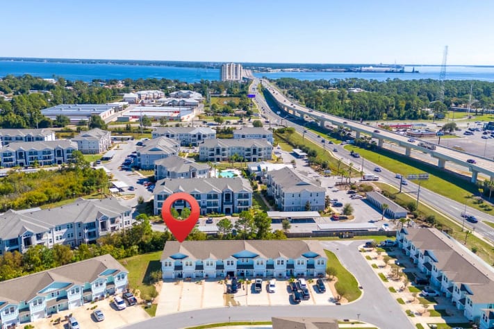 Stunning community amenities featuring a resort-style pool and scenic lake with fountain views. Relax poolside, enjoy the sunshine, or take in the peaceful surroundings perfect for a refreshing getaway.