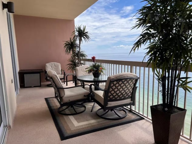 Our lovely balcony enclosed with patio furniture and 3 chairs with cushions for added comfort.