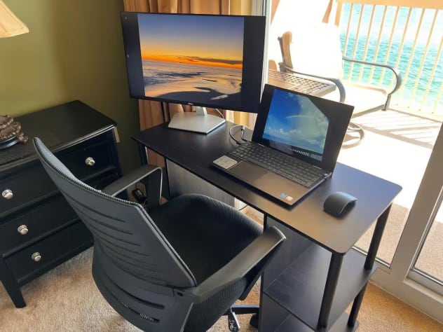 Our work from home station with calming views of the ocean &ndash; an ideal set up!