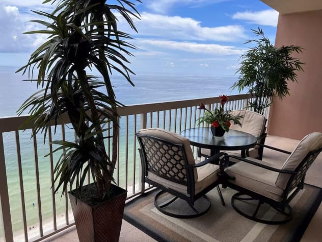 Our lovely balcony enclosed with patio furniture and 3 chairs with cushions for added comfort.