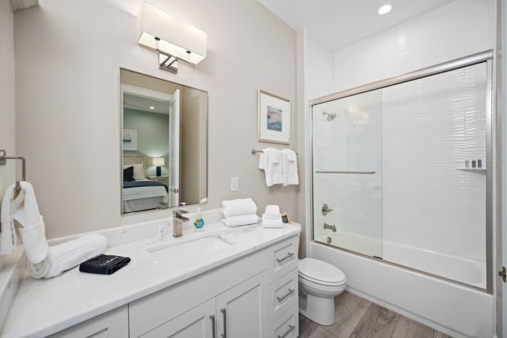 First floor primary king room with full size bathroom including tub-shower combo.