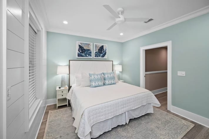 Second floor primary room with king size bed.