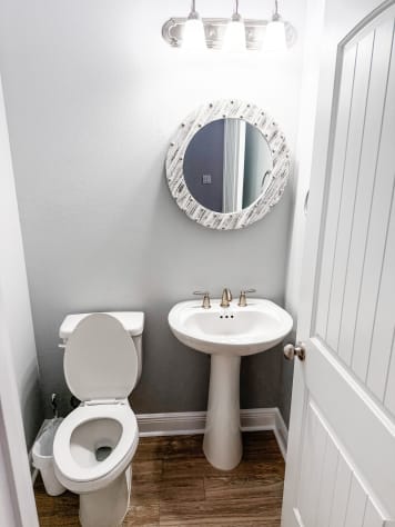 Guest Half Bath Located Upstairs 