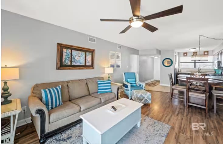 Beachy vibe and beachy colors in the living room and throughout the condo.